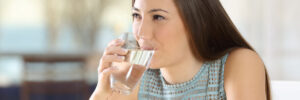 Woman drinking a glass of water